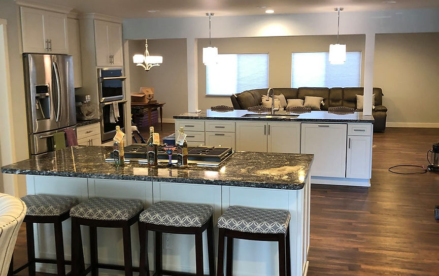 Warm, modern kitchen remodeled by King Bee Construction